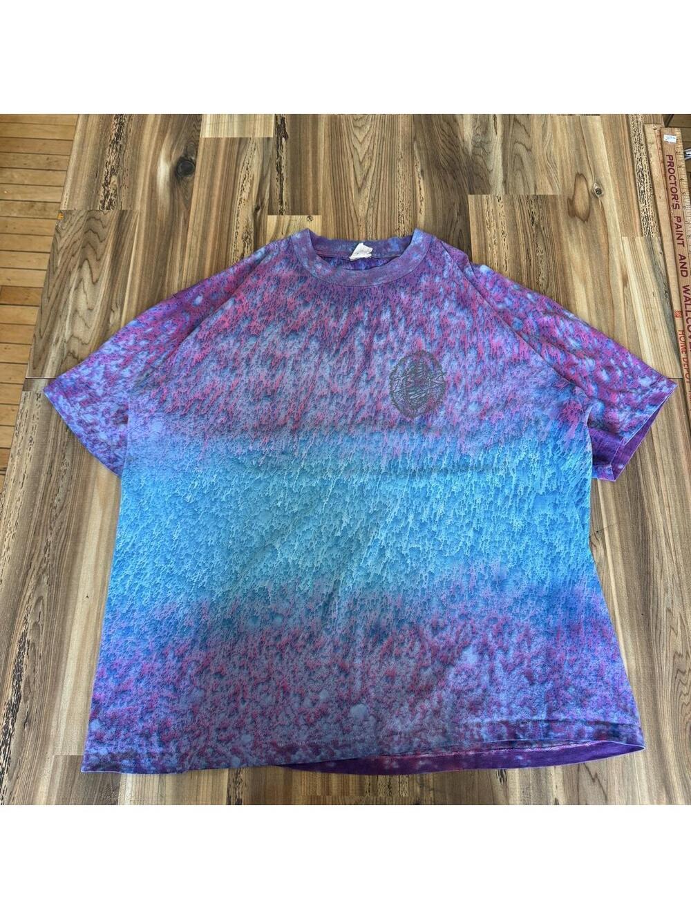 90s vintage tie-dye t-shirt with blue and purple gradient and speckled texture